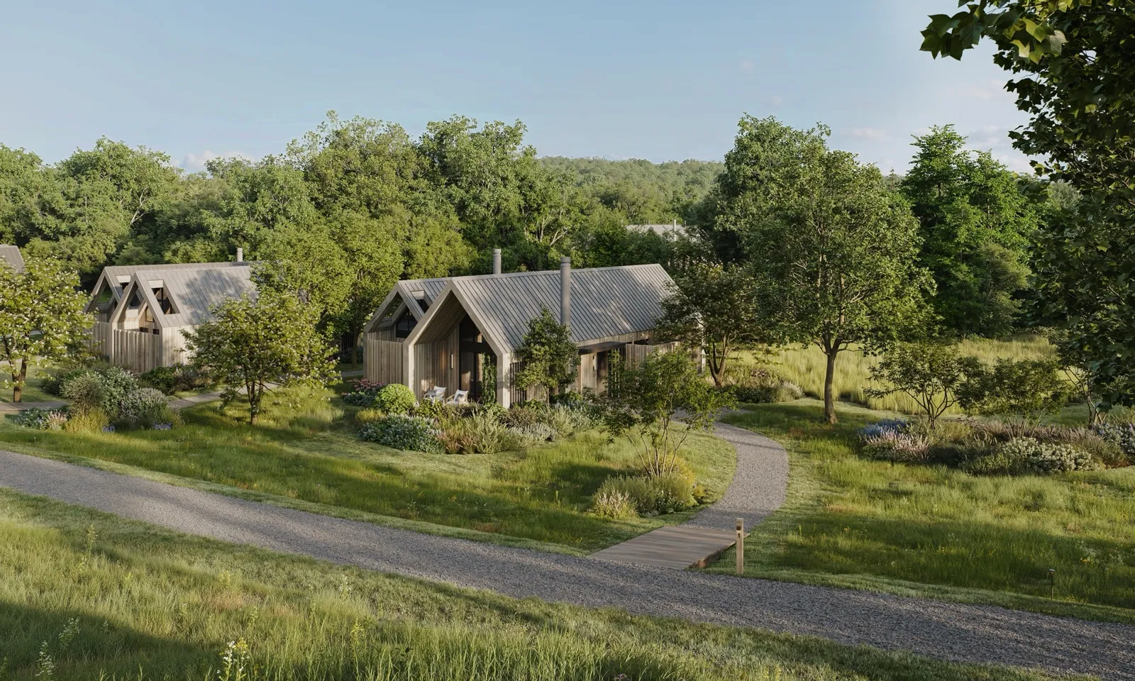 Rendu des cottages en bois du futur Six Senses Hudson Valley au milieu des prairies et des arbres