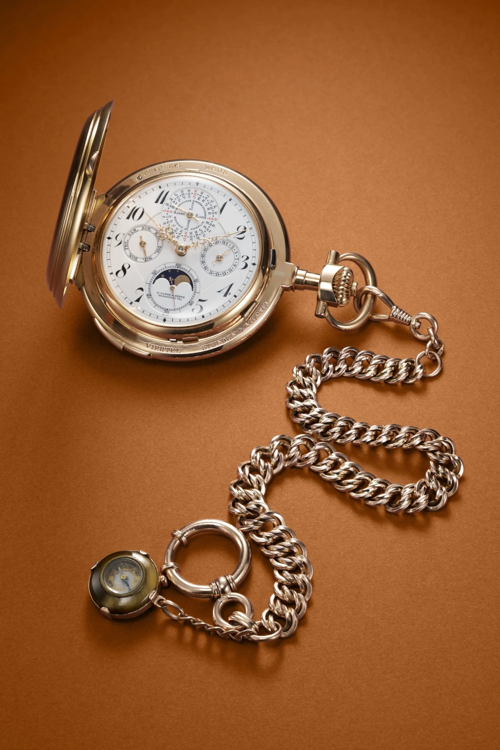 Montre de poche A. Lange & Söhne en or rose de 1914 à quantième perpétuel, phases de lune et grande sonnerie, avec sa chaîne