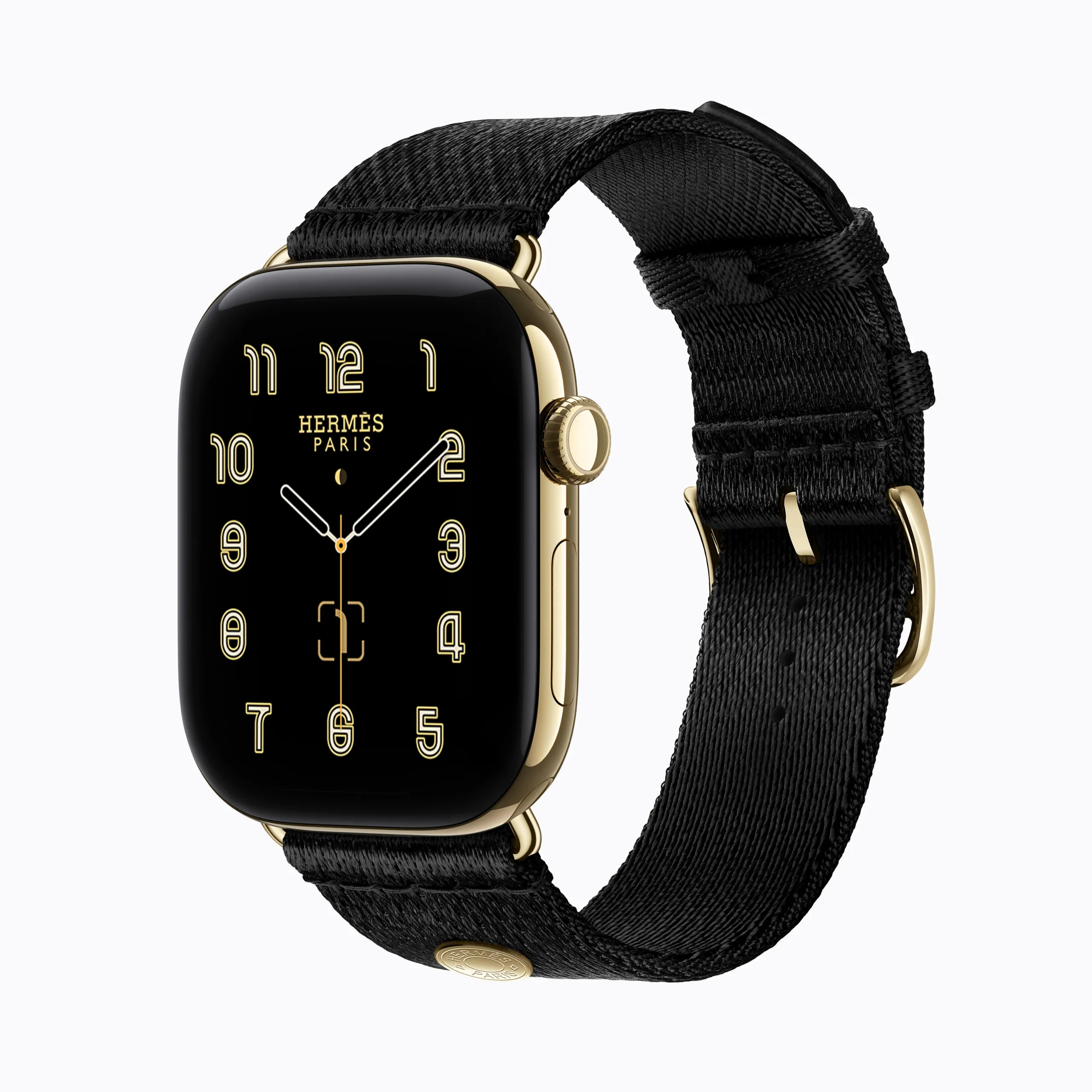 Apple Watch Hermès Series 12 in glossy gold titanium with black Satin Clou de Selle strap and Hermès Paris dial