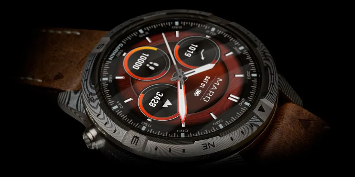Detail of the Damascus steel case of a Garmin MARQ Adventurer smartwatch