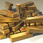Pile de lingots d'or, illustration du mythe du yacht History Supreme