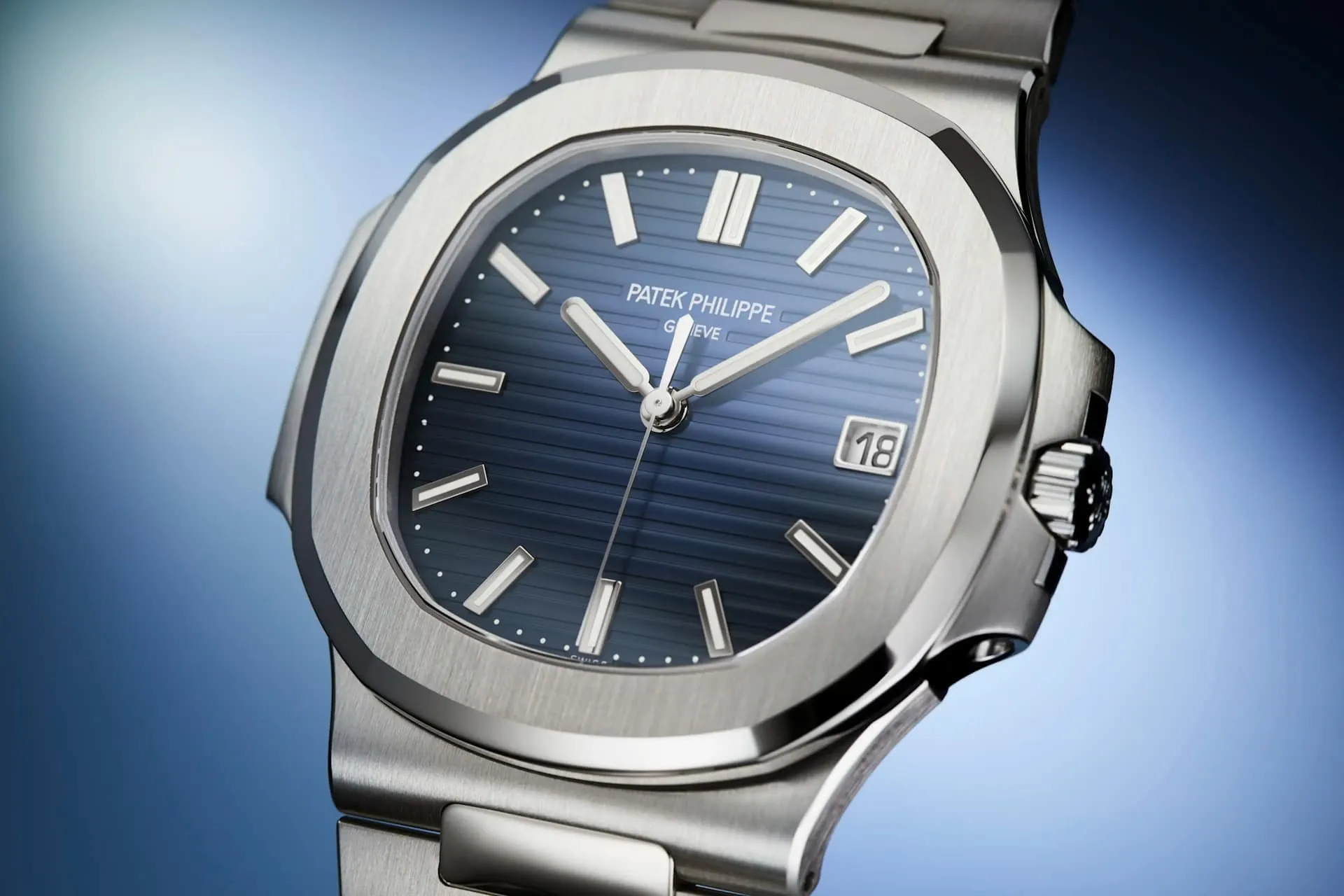 Patek Philippe Nautilus 5811/1G in white gold, blue sunburst dial